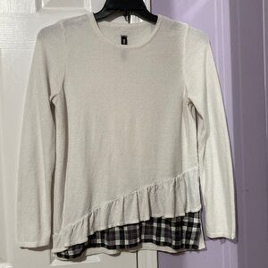 White sweater top with ruffle and plaid details